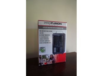 BRAND NEW IN BOX PROFUSION UTILITY HEATER WITH THERMOSTAT