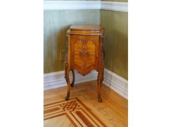 ANTIQUE SIDE TABLE WITH DOOR, WITH CARVED DETAILS