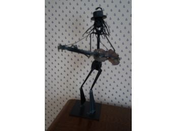METAL FIGURINE OF A MAN PLAYING A GUITAR, 14IN HEIGHT