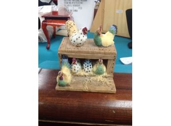 Resin Sculpture Of A Group Of Hens In A Coop