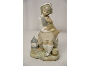 LLADRO OF A WOMAN SITTING WITH A DOG! 8IN HEIGHT!