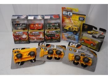 VARIETY LOT OF TOY CARS, INCLUDING CAT TRUCKS