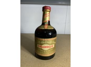 VINTAGE SHORTLY BOTTLE OF DRAMBUIE WITH TAX STAMP