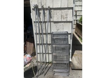Tall Metal Rolling Rack With Four Shelves