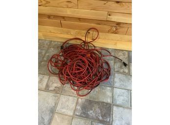 RED AND BLACK LONG EXTENSION CORD