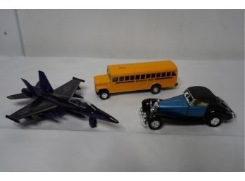 LOT OF 2 TOY CARS AND 1 US NAVY JET, A8