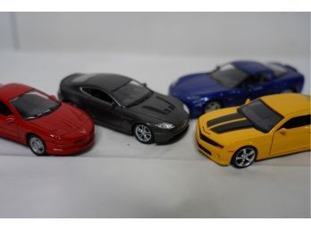 LOT OF 4 TOY CARS, A22
