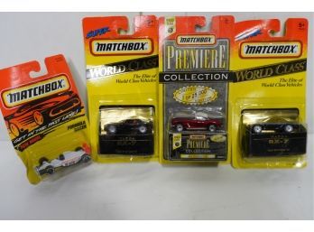 LOT OF 4 MATCHBOX TOY CARS,  A31