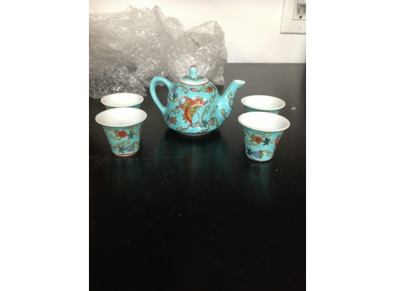 Never Used Small Turquoise Asian Tea Pot With Flowers & Butterfly Design With Matching Cups.
