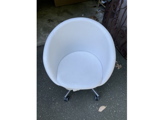Modern Looking White Chair On Wheels - Could Use A Food Cleaning