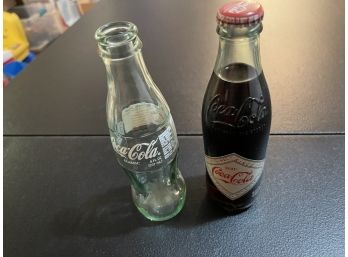 Lot Of Coca Cola Glasses And Bottles