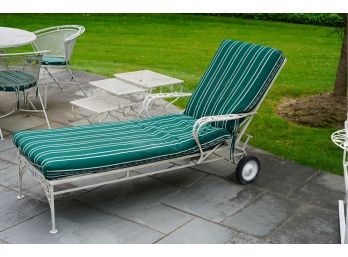 OUTDOOR METAL LOUNGE CHAIR ON WHEELS WITH GREEN CUSHION