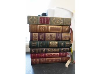 LOT OF 7 LEATHER-BOUND BOOKS INCLUDING THE GRAPES OF WRATH BY JOHN STEINBECK