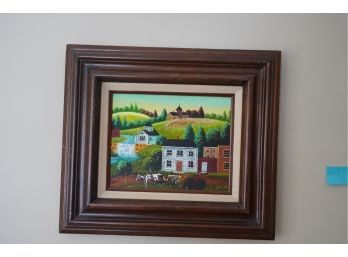 REPRODUCTION PAINTING OF A VILLAGE IN A WOOD FRAME