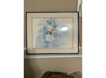 PRINT OF A FLOWER IN A LIGHT BLUE BACKGROUND SIGNED