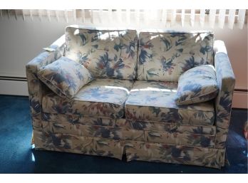 FLOWER PATTERN LOVESEAT WITH PULLOUT BED