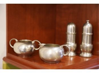 SALT AND PEPPER SHAKERS AND 2 PEWTER SAUCERS