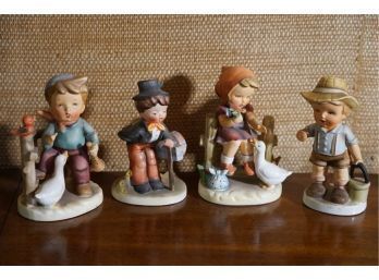 LOT OF 4 MADE IN JAPAN SMALL FIGURINES OF CHILDREN, 5IN HIGH