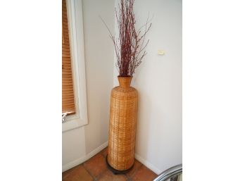 TALL WICKER VASE ON SMALL ROUND STAND