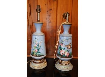 ANTIQUE PAIR OF PORCLEIN LAMPS WITH PAINTED BIRD DESIGN AND METAL BASE