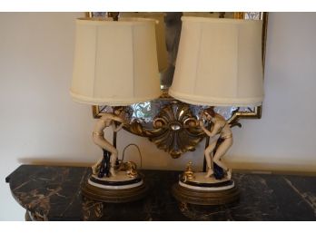PAIR OF PORCELAIN ART DECO LAMPS WITH SNAKE CHARMER DESIGN