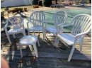 LOT OF FOUR PLASTIC PATIO CHAIRS SMALL TABLE