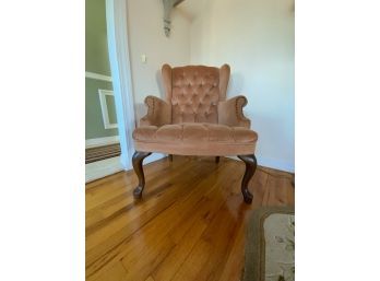 ANTIQUE CUSHION CHAIR WITH WOODEN LEGS AND BEADED ARMS