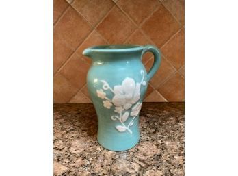 GREEN FLORAL PORCELAIN PITCHER WITH WHITE FLOWER DESIGN