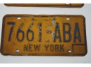 MATCHING PAIR -LOT OF 2 COLLECTIBLE NY YELLOW LICENSE PLATE