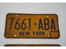 MATCHING PAIR -LOT OF 2 COLLECTIBLE NY YELLOW LICENSE PLATE