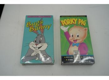 SEALED IN PLASTIC!- OLD NEW STOCK SEALED BUGS BUNNY AND PORKY PIG VHS TAPES