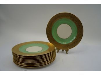 GORGEOUS SET OF 11 PLATES WITH GOLD TRIM OUTLINING AND INNER GREEN COLOR