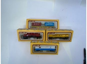 SET OF 4 NEW LIFE-LIKE TOY TRAINS