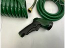 NEW IN BOX 50 FOOT COIL HOSE AND 6 FT EXTENSION HOSE WITH ONOFF STAKE VALVE