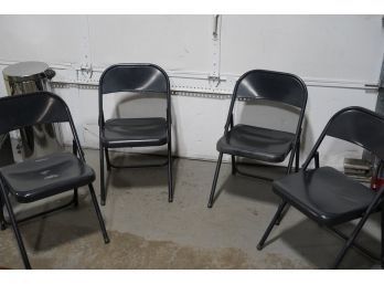 EVERYONE NEEDS! LOT OF 4 BLACK METAL FOLDABLE CHAIRS