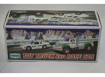 NEW COLLECTIBLE HESS TOY TRUCK AND RACE CAR