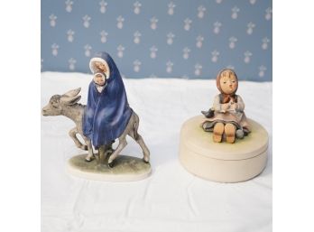 Ceramic Lady On Donkey With Child And Child Sitting In Grass