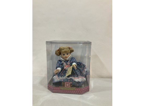 ANIMATED WIND UP MUSICAL DOLL