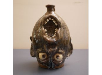 (UPSIDE DOWN JUG ) BY WILLIAM A FLOWERS