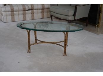 ANTIQUE GLASS TOP TABLE WITH GOLD COLOR METAL BOTTOM