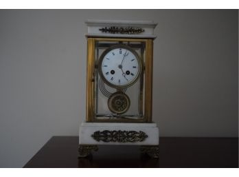 CLOCK WITH MARBLE BOTTOM AND TOP