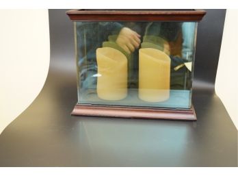 GLASS CASE WITH CANDLES