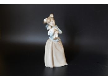 NAO BY LLADRO OF LITTLE GIRL