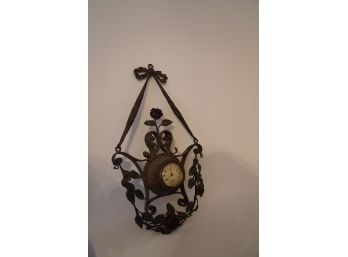 ANTIQUE TWO-TONE ANTIQUE METAL HANGING CLOCK WIND UP