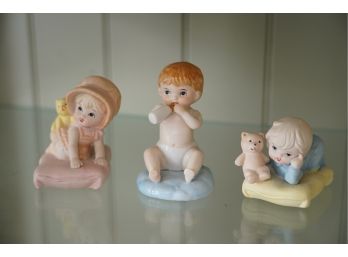 LOT OF 3 BABY FIGURINES