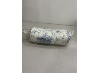 SMALL WHITE AND BLUE PILLOW, NEW IN PLASTIC 12IN LONG