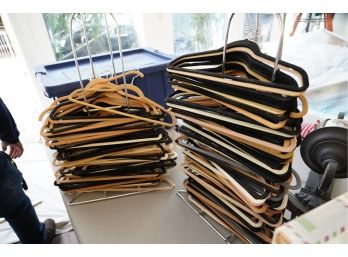 LARGE LOT OF HANGERS WITH METAL CHROME HOLDERS
