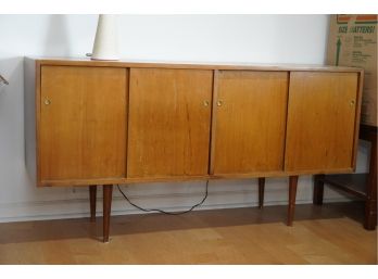 MID-CENTURY BUFFET SIDE CREDENZA  WITH SIDLING DOORS AND 3 DRAW PULL OUT.