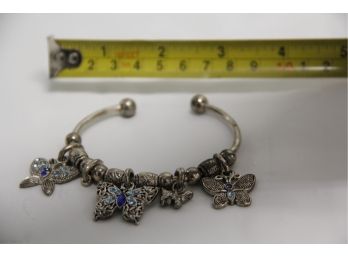 Sterling Silver Bangel Bracelet With Charms Of Butterflys