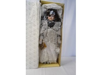 A CONNOISSEUR COLLECTION DOLL WITH CERTIFICATE OF AUTHENTICITY, AUDREY